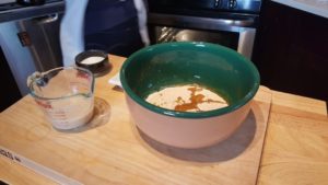 Dissolve the yeast in warm water. Then in a bowl, mix the flour, oil, sugar, and malt. Mix for one minute, while mixing, slowly pour the water yeast mixture into the bowl.